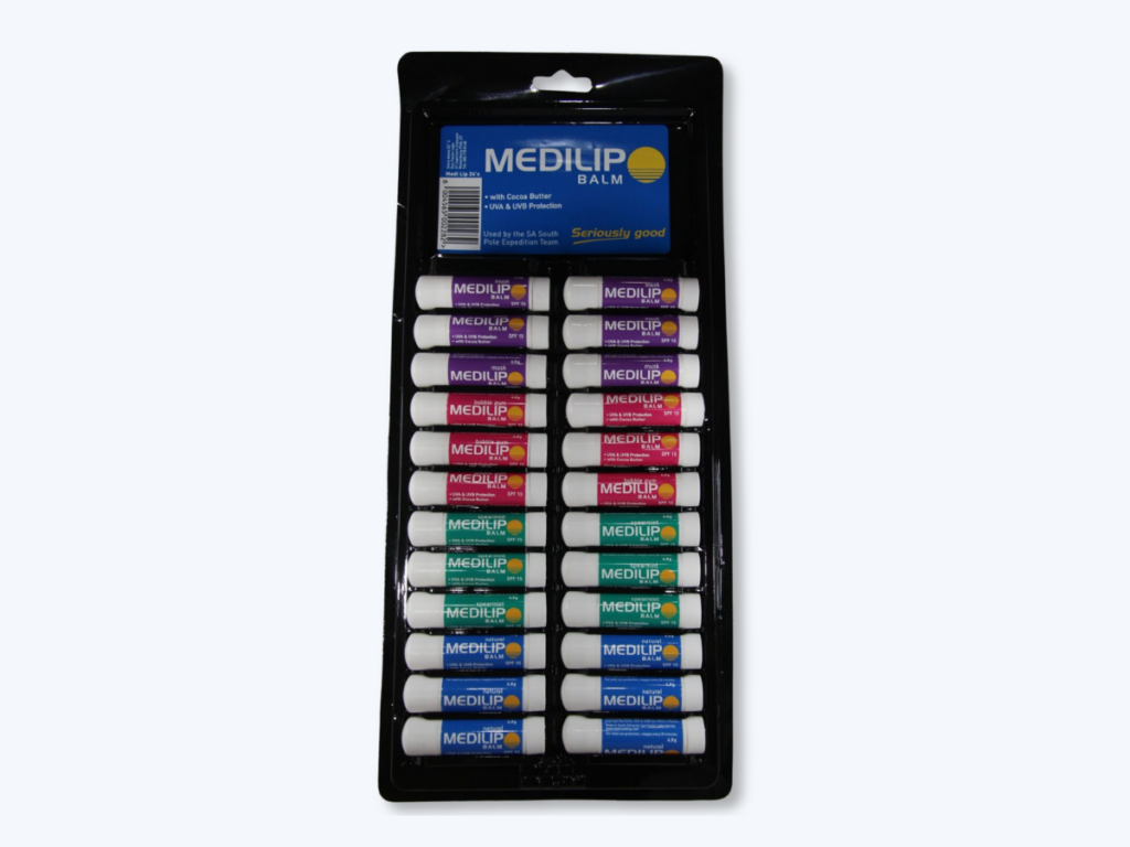 Hanging retail display tray filled with branded lip balms